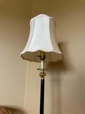 YOKE BACK ACCENT CHAIR AND A FLOOR LAMP
