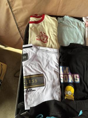 A VARIETY OF SHIRTS, HOODIE AND JEANS