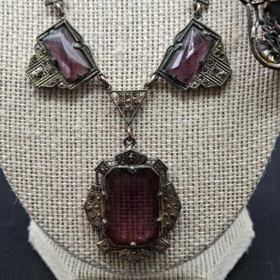 LOT 3J: Three Art Deco Necklaces, Matching Brooch, and Bracelet with Amethyst Glass Stones