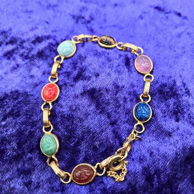 LOT 21J: Two Scarab Bracelets, Opal Stick Pin, and More