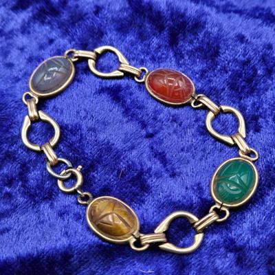 LOT 21J: Two Scarab Bracelets, Opal Stick Pin, and More