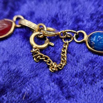 LOT 21J: Two Scarab Bracelets, Opal Stick Pin, and More