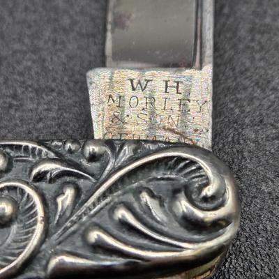 LOT 22J: Two Pairs of Antique Rimless Eyeglasses in Cases, WH Morley & Sons Pocket Knife with Case, Tiny Book Locket, and More