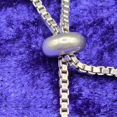 LOT 29J: Sterling Silver and Diamond Adjustable Infinity Bracelet
