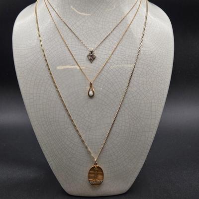 LOT 32J: 24 Inch 925 Chain with Seed Pearl Embellished 1/10 10k Gold Filled Pendant, 18 Inch 1/20 14k Gold Filled Chain with Opal Charm,...