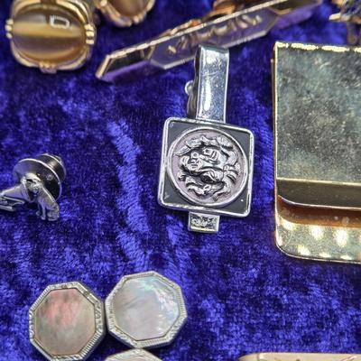 LOT 42J: Collection of Tie Clips, Tack Pins, Cuff Links, Buttons, Money Clips, and More