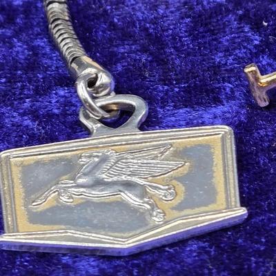 LOT 42J: Collection of Tie Clips, Tack Pins, Cuff Links, Buttons, Money Clips, and More