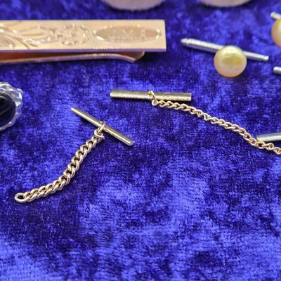 LOT 42J: Collection of Tie Clips, Tack Pins, Cuff Links, Buttons, Money Clips, and More