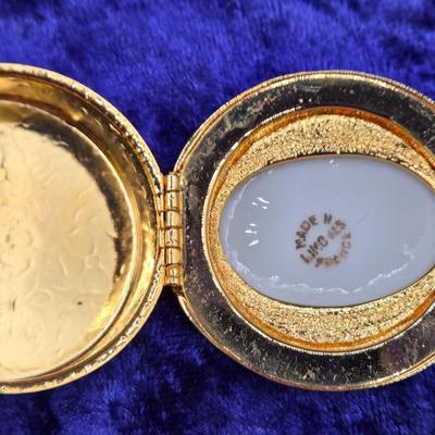 LOT 52J: Assortment of 14-24 Inch Goldtone Necklaces, Trifari Necklace, and Limoges Pill Box