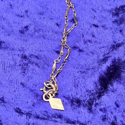 LOT 57J: Multiple Bracelets Including Sarah Coventry, Ten Commandments Charm Bracelet, Trifari Necklace, and More
