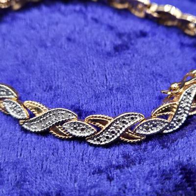 LOT 57J: Multiple Bracelets Including Sarah Coventry, Ten Commandments Charm Bracelet, Trifari Necklace, and More