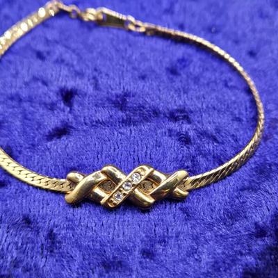 LOT 57J: Multiple Bracelets Including Sarah Coventry, Ten Commandments Charm Bracelet, Trifari Necklace, and More