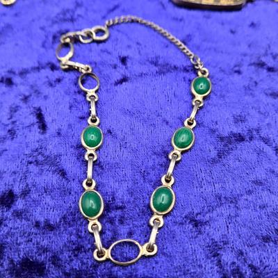 LOT 57J: Multiple Bracelets Including Sarah Coventry, Ten Commandments Charm Bracelet, Trifari Necklace, and More