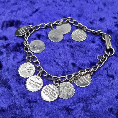 LOT 57J: Multiple Bracelets Including Sarah Coventry, Ten Commandments Charm Bracelet, Trifari Necklace, and More