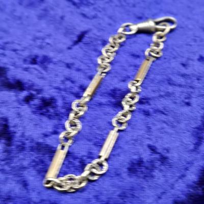 LOT 57J: Multiple Bracelets Including Sarah Coventry, Ten Commandments Charm Bracelet, Trifari Necklace, and More