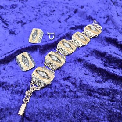 LOT 57J: Multiple Bracelets Including Sarah Coventry, Ten Commandments Charm Bracelet, Trifari Necklace, and More