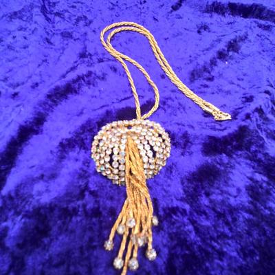 LOT 59J: Gold Tone Rope Necklace with Rhinestone Cluster and Waterfall Strands, Glass Charm Holder Pendant with Assorted Charms, and...