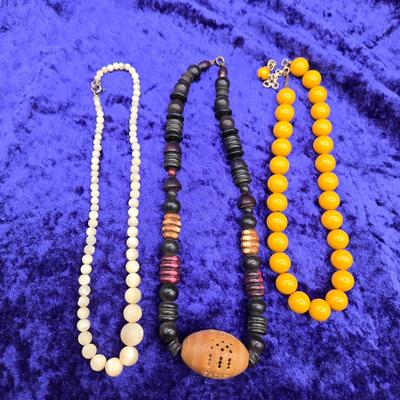 LOT 63J: Multiple Necklaces of Many Styles Including Beads, Wood, and More