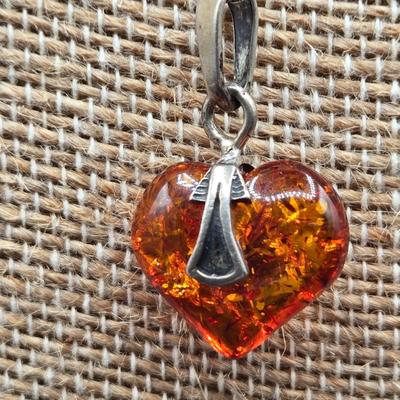 LOT 71: 17 Inch 925 Silver Necklace with Amber Colored Heart Charm
