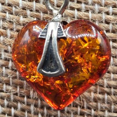 LOT 71: 17 Inch 925 Silver Necklace with Amber Colored Heart Charm