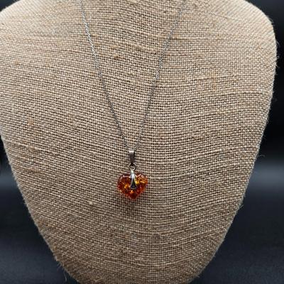 LOT 71: 17 Inch 925 Silver Necklace with Amber Colored Heart Charm