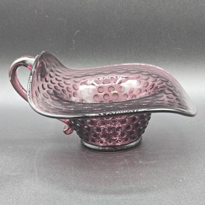 LOT 76: Vintage Hand Painted Fenton Custard Glass Vase, Hobnail Glass Bowl with Handle, Porcelain Hat Pin Holder, and Art Nouveau Mini...