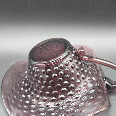 LOT 76: Vintage Hand Painted Fenton Custard Glass Vase, Hobnail Glass Bowl with Handle, Porcelain Hat Pin Holder, and Art Nouveau Mini...