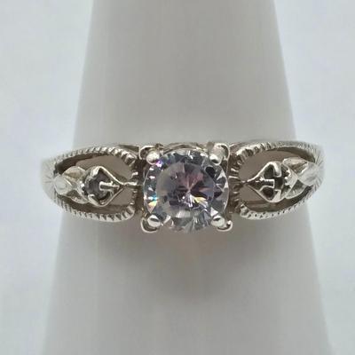 LOT 97J: Four Sterling Silver Rings and One Adjustable Toe Ring / 14.5 gtw