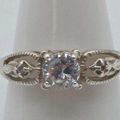 LOT 97J: Four Sterling Silver Rings and One Adjustable Toe Ring / 14.5 gtw