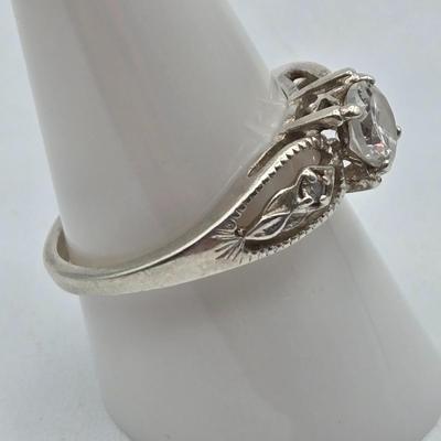 LOT 97J: Four Sterling Silver Rings and One Adjustable Toe Ring / 14.5 gtw