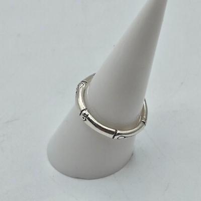 LOT 102J: Four Sterling silver Rings / 22.1 gtw