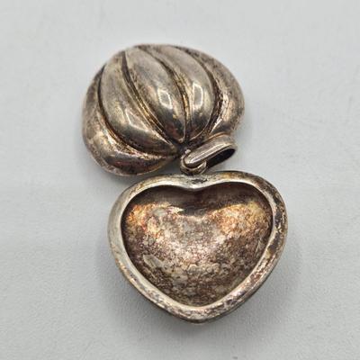 LOT 106J: Heart Shaped Sterling Silver Pendant and Three Lockets, One with Three Changeable Stones / 22.3 gtw