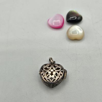 LOT 106J: Heart Shaped Sterling Silver Pendant and Three Lockets, One with Three Changeable Stones / 22.3 gtw