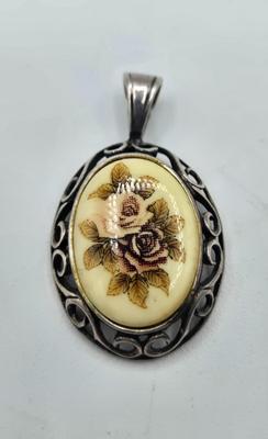 LOT 112J: Three Sterling Silver Pendants / 11.8 gtw