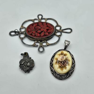 LOT 112J: Three Sterling Silver Pendants / 11.8 gtw