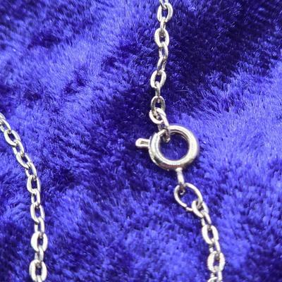LOT 113J: Multiple Necklaces, One with Matching Earrings