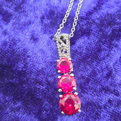 LOT 113J: Multiple Necklaces, One with Matching Earrings
