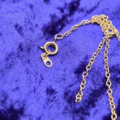 LOT 113J: Multiple Necklaces, One with Matching Earrings