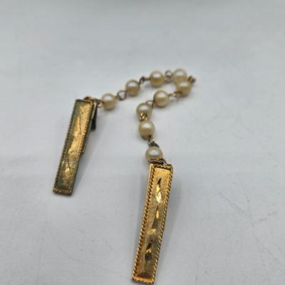 LOT 115J: Two Multistrand Faux Pearl Necklaces and Sweater Clip