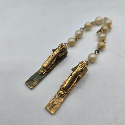 LOT 115J: Two Multistrand Faux Pearl Necklaces and Sweater Clip