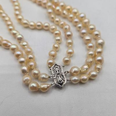 LOT 115J: Two Multistrand Faux Pearl Necklaces and Sweater Clip