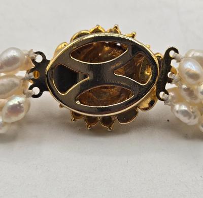 LOT 115J: Two Multistrand Faux Pearl Necklaces and Sweater Clip