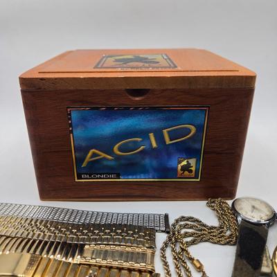 LOT 117: ACID Blondie Cigar Box with Watch Bands and More