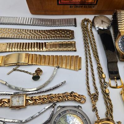 LOT 117: ACID Blondie Cigar Box with Watch Bands and More