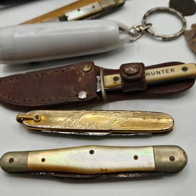 LOT 118: ACID Kuba Kuba Cigar Box with10k Gold Filled Ring, Foreign Coins, Pens, Buttons, Pocket Knives, and More