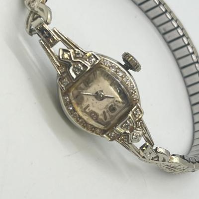LOT 121: 14K Solid White Gold Ladies Watch (Not Working) w/ Diamonds on Speidel Stretch Band