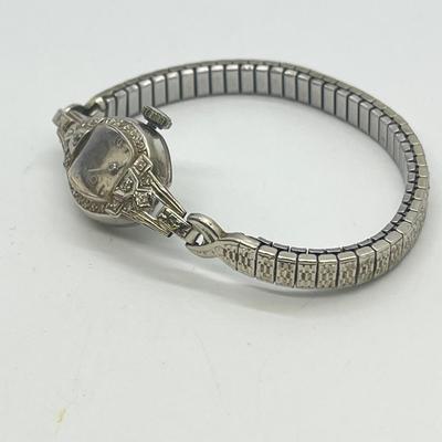 LOT 121: 14K Solid White Gold Ladies Watch (Not Working) w/ Diamonds on Speidel Stretch Band