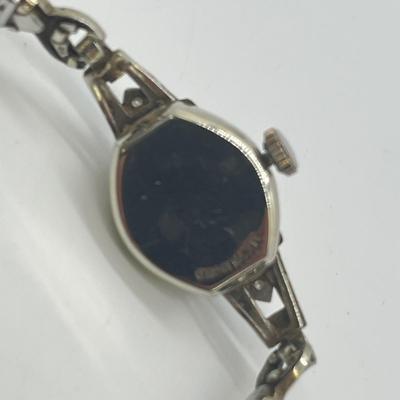 LOT 121: 14K Solid White Gold Ladies Watch (Not Working) w/ Diamonds on Speidel Stretch Band