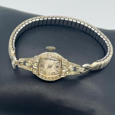 LOT 121: 14K Solid White Gold Ladies Watch (Not Working) w/ Diamonds on Speidel Stretch Band