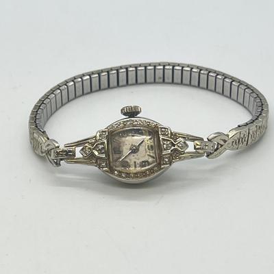 LOT 121: 14K Solid White Gold Ladies Watch (Not Working) w/ Diamonds on Speidel Stretch Band